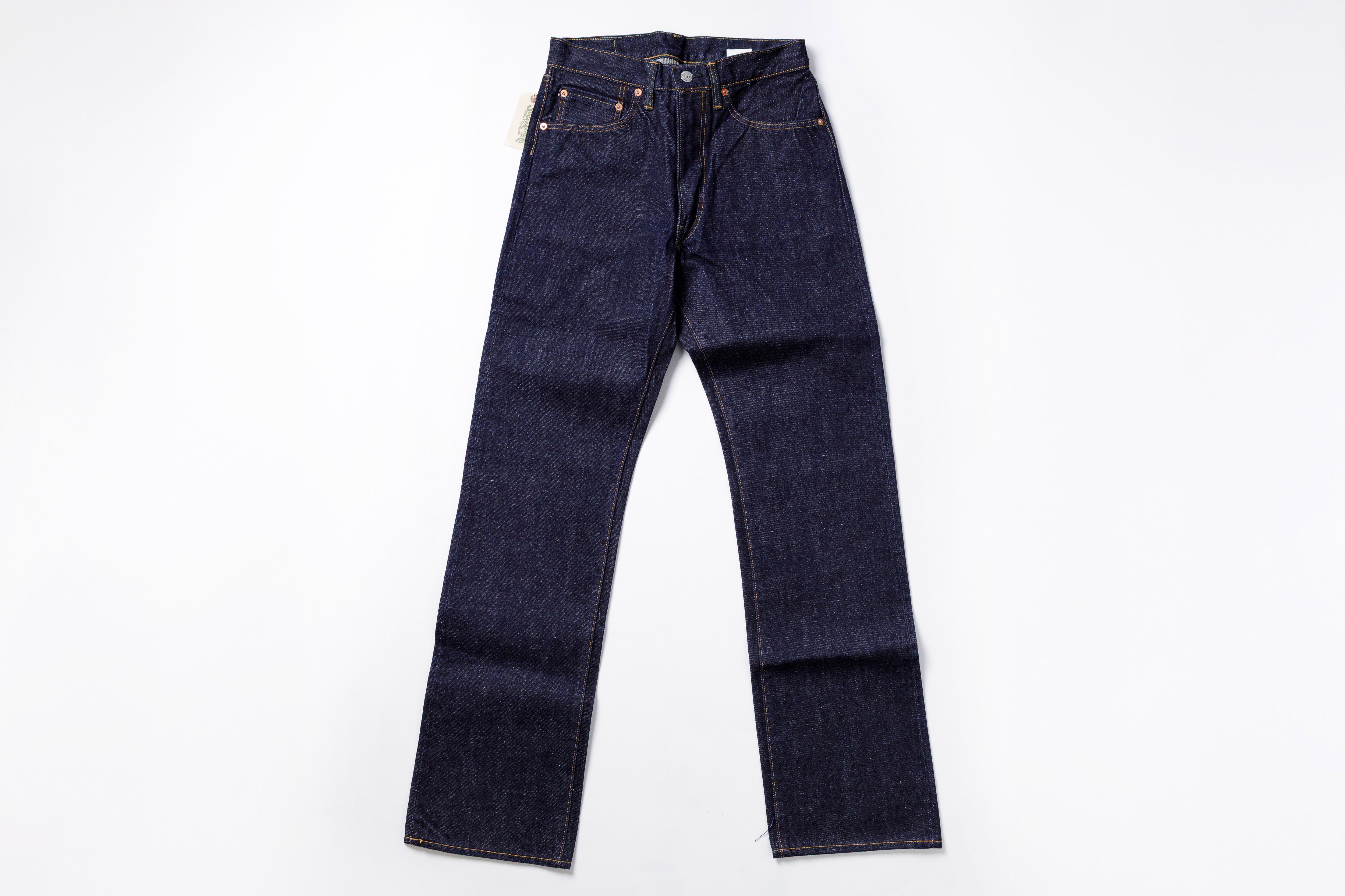 Pair of dark blue jeans on a white background
