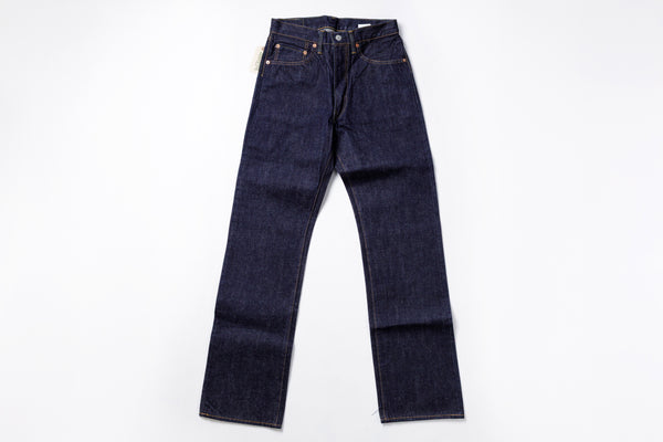 Pair of dark blue jeans on a white background