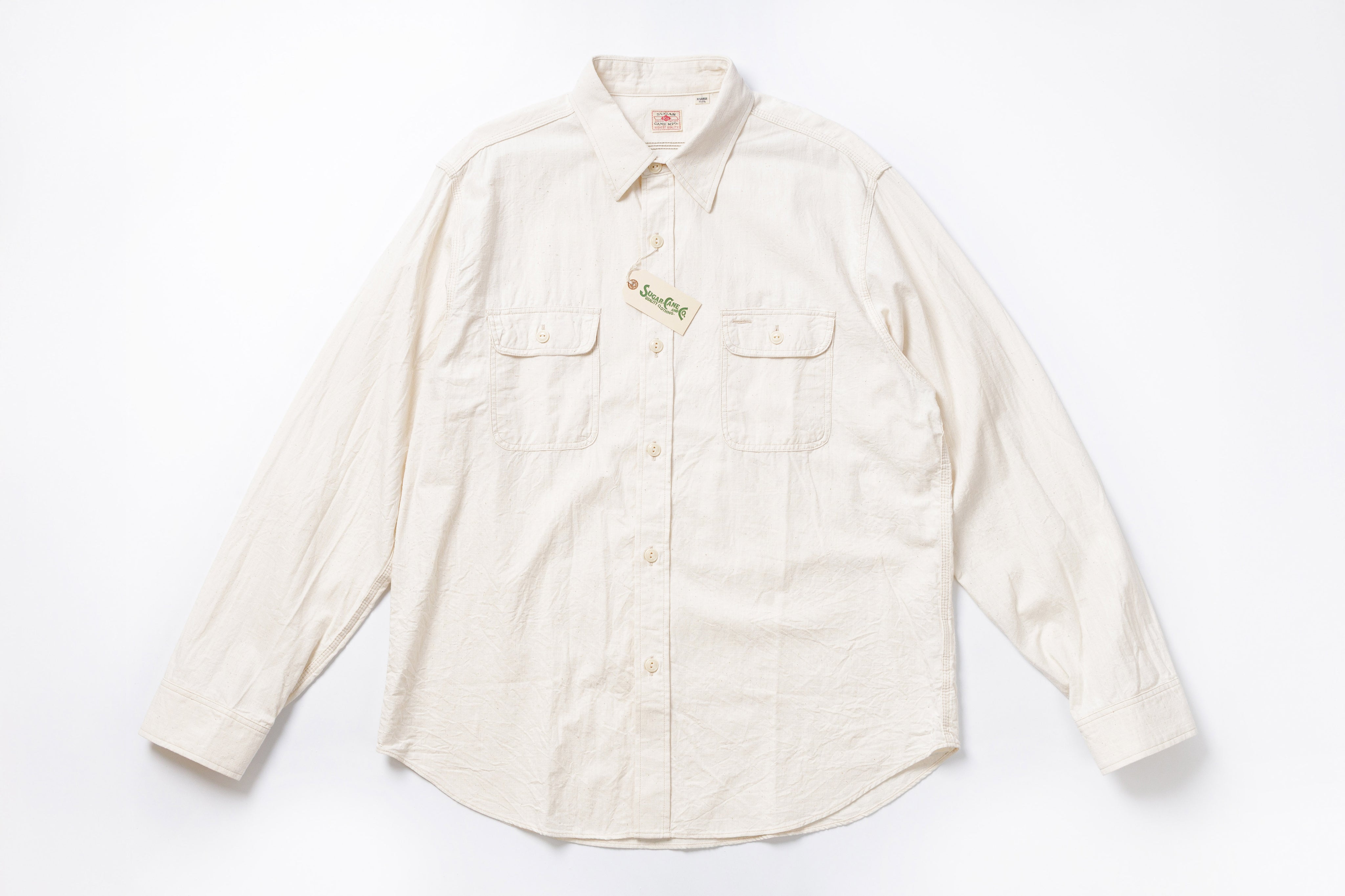 White button-up shirt on a white background