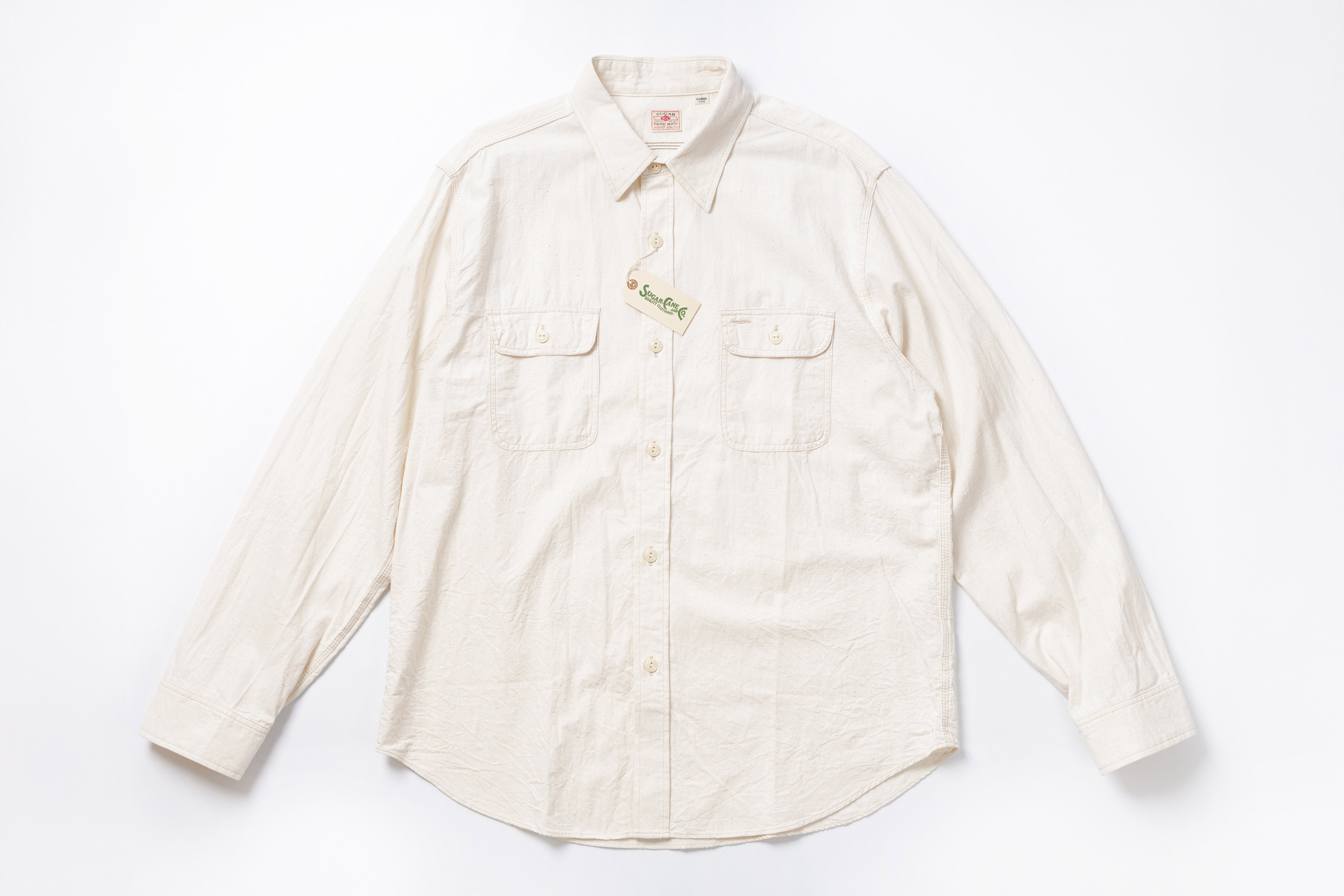 White button-up shirt on a white background