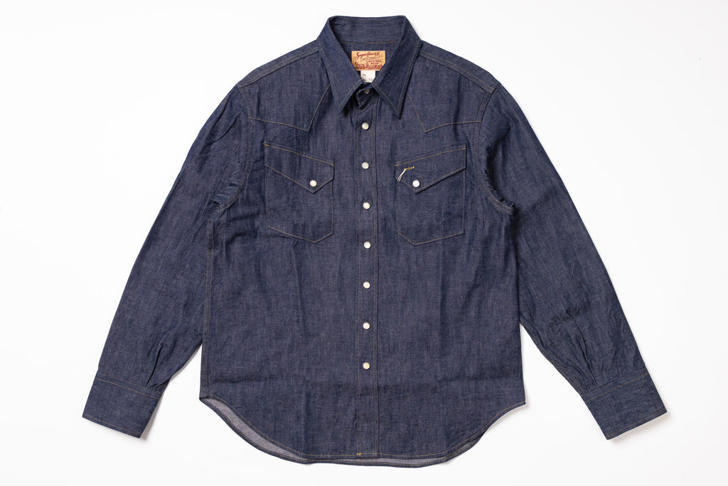 Blue denim shirt on a white background