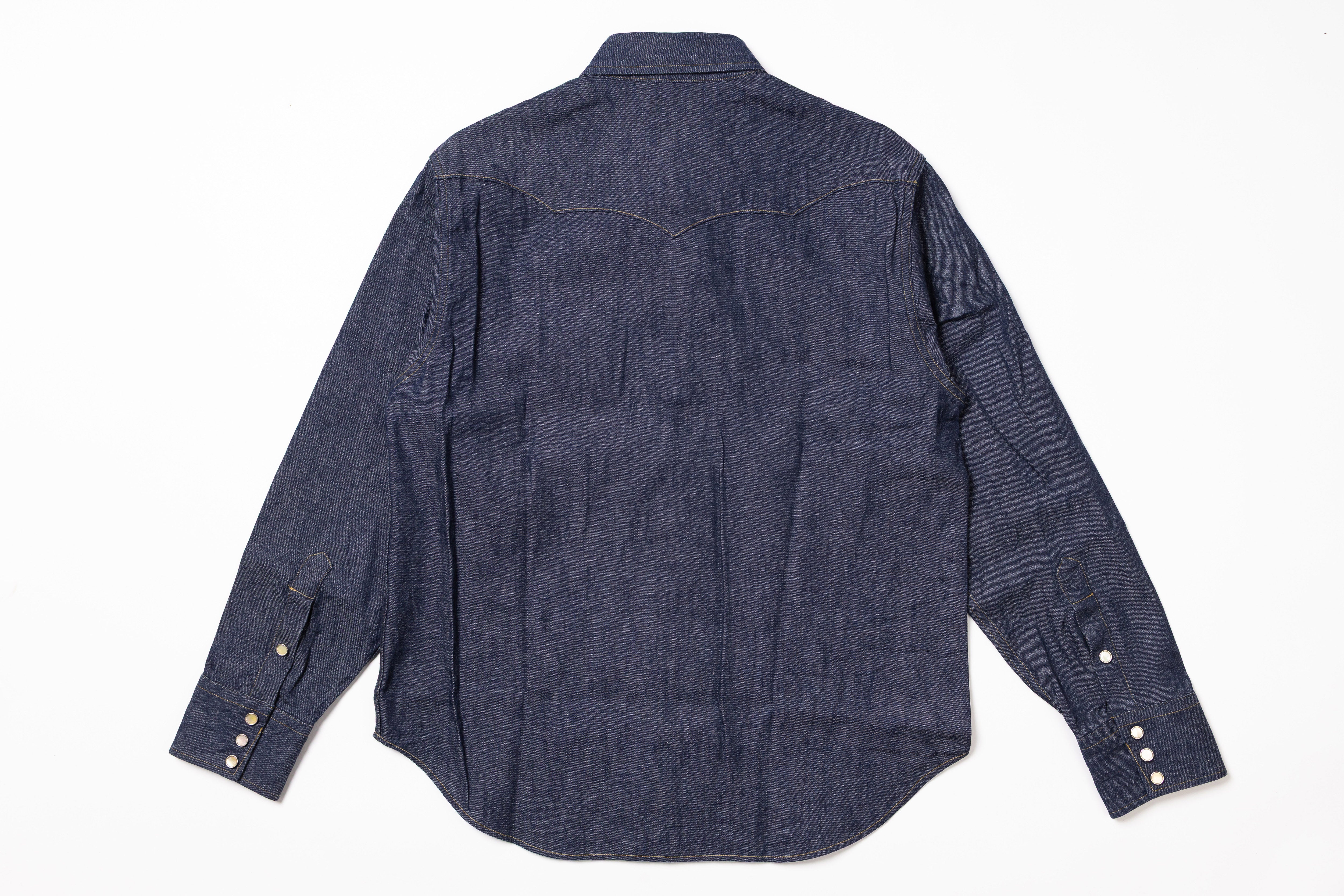 Blue denim shirt on a white background