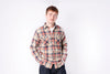 A man wearing a flannel shirt on a white background