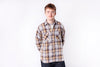 Man wearing a plaid shirt on a white background