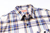 Collar of a flannel shirt on a white background