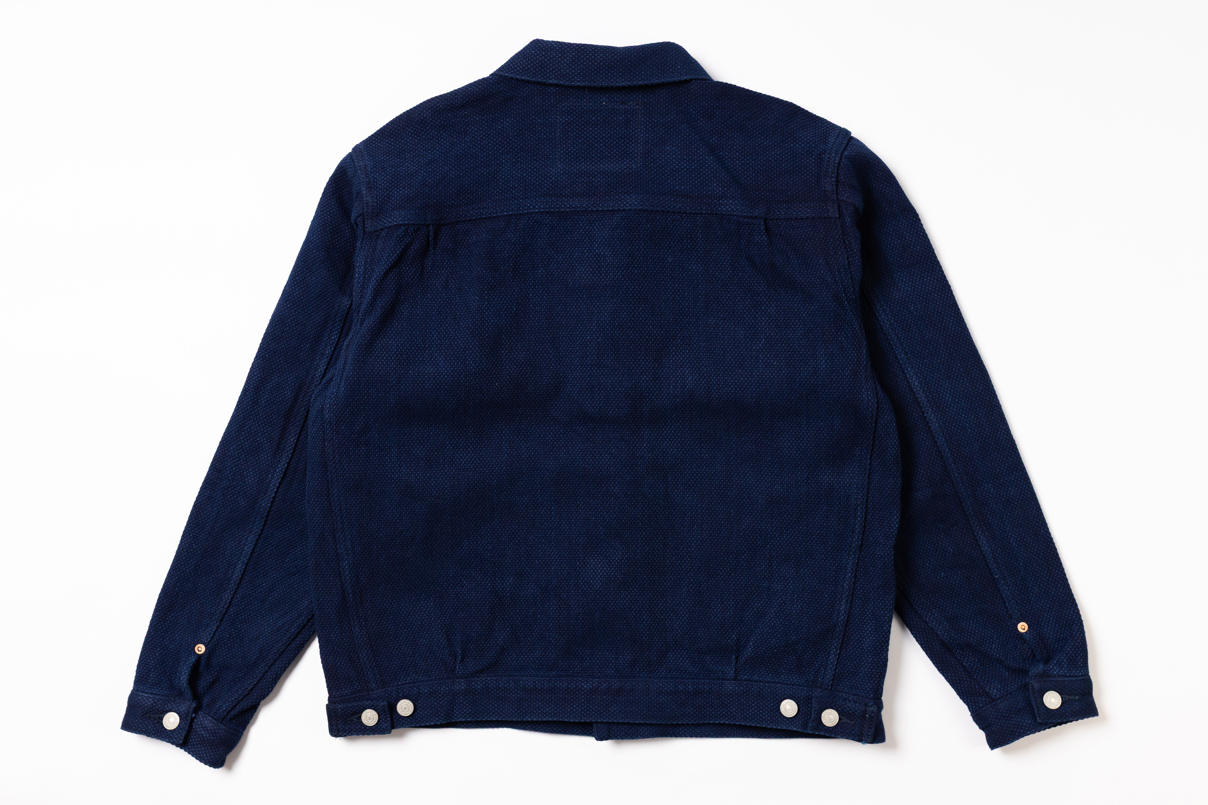 Navy blue jacket on a white background