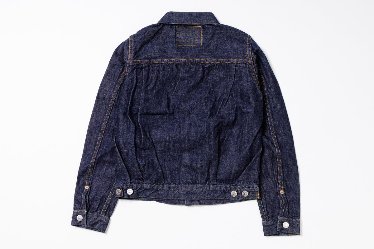 Blue denim jacket on a white background