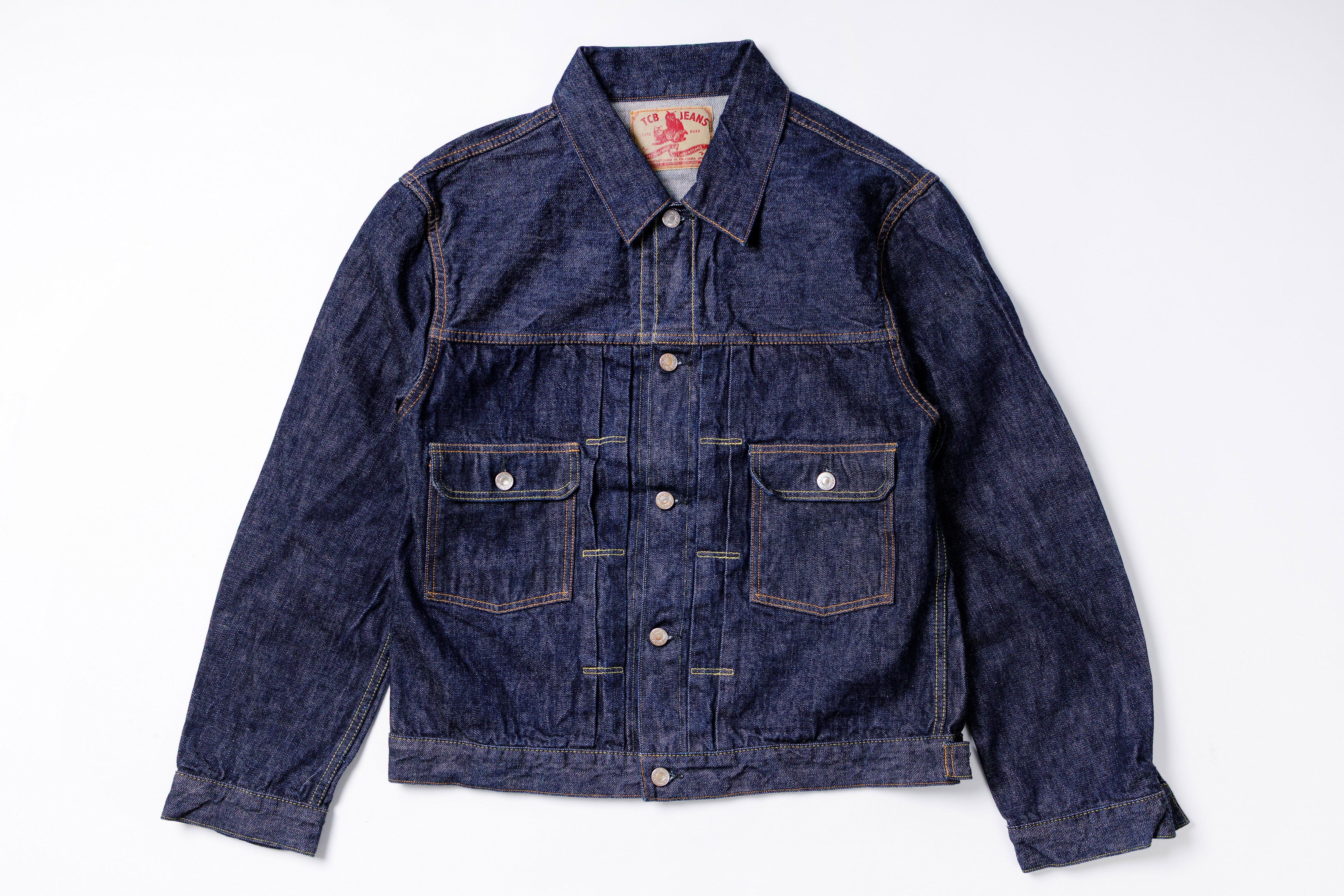 Blue denim jacket on a white background