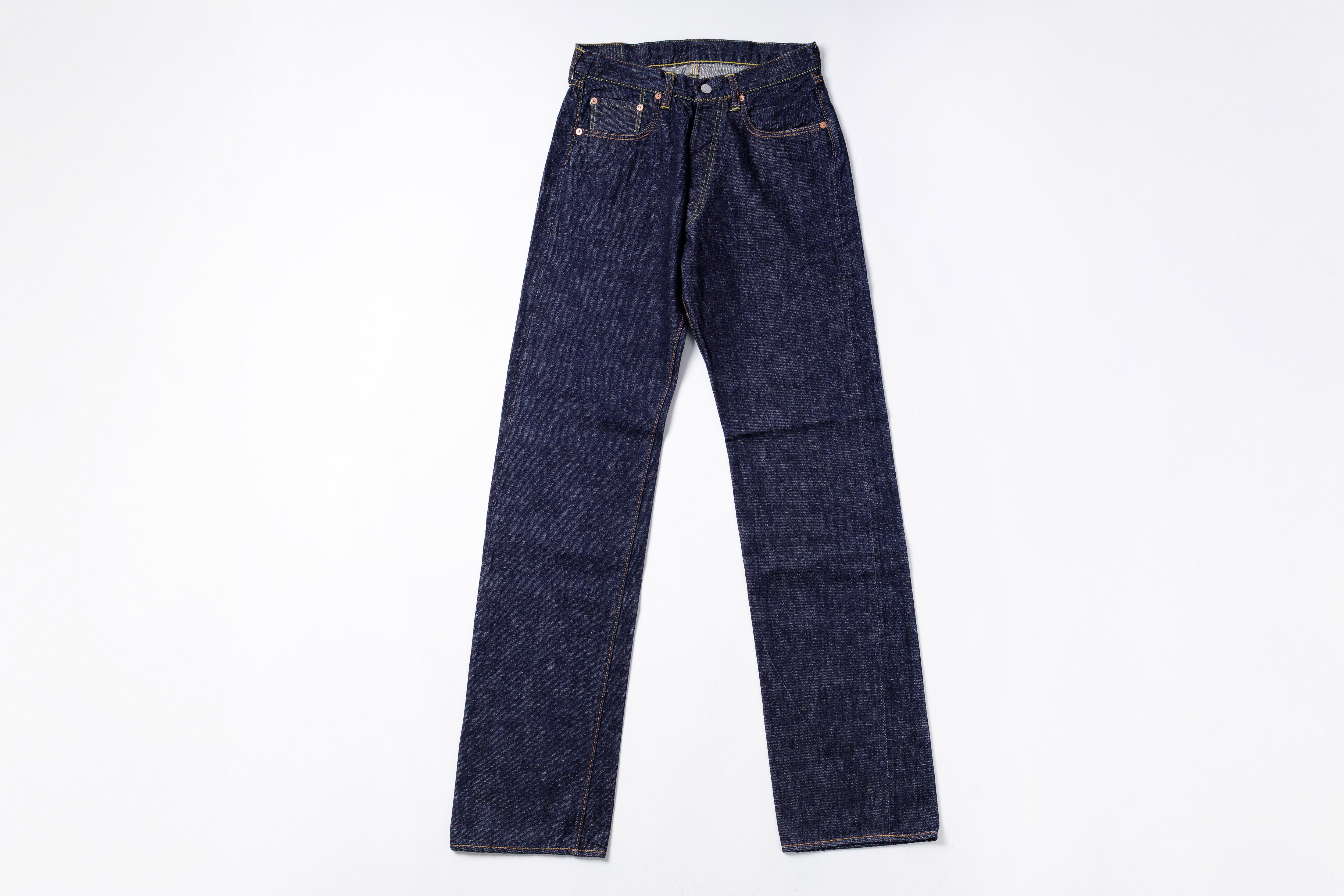 Pair of dark blue jeans on a white background