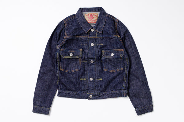 Blue denim jacket on a white background