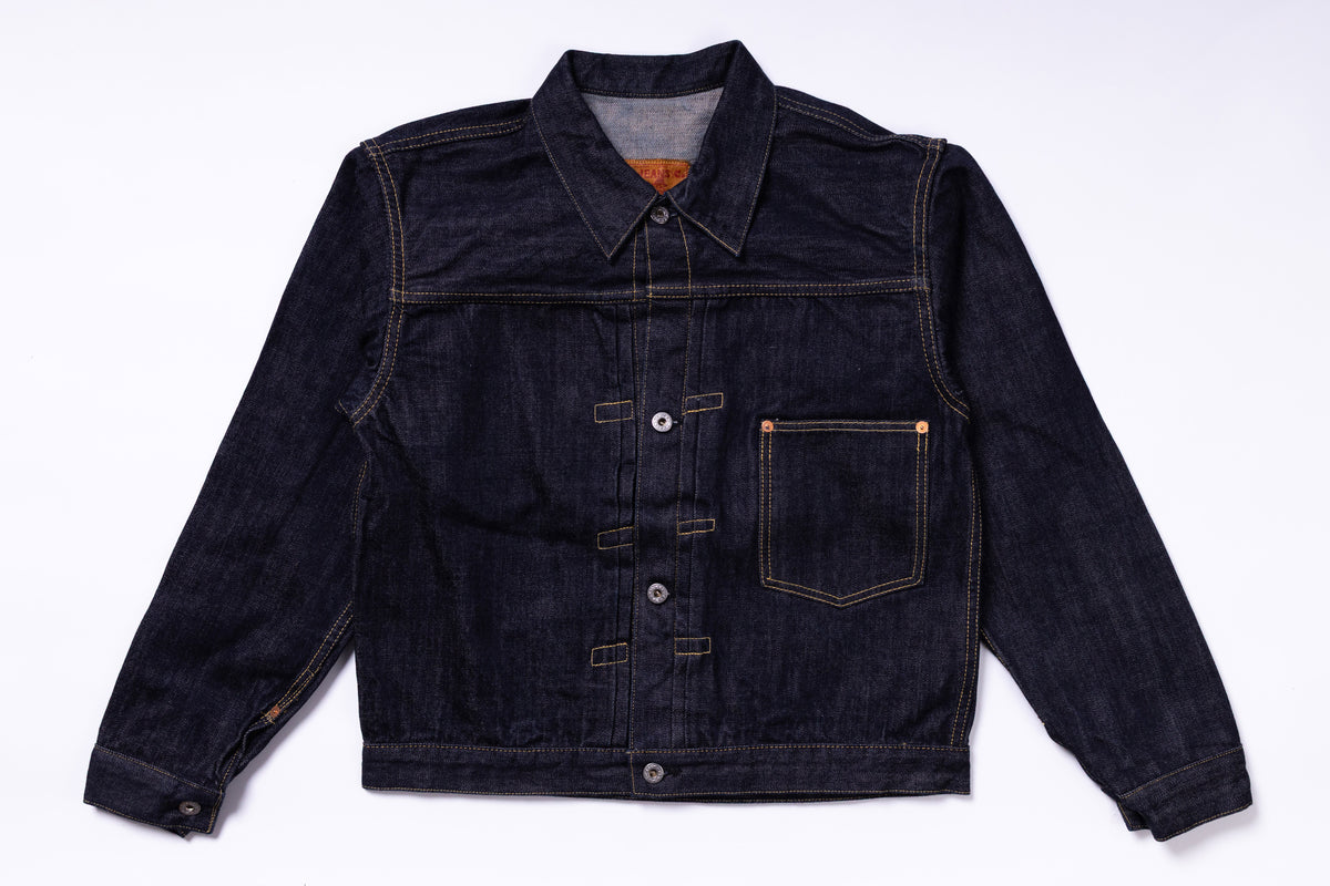 Dark denim jacket on a light gray background