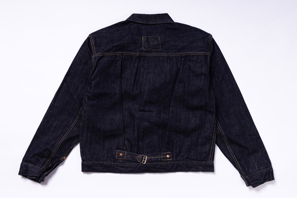Dark denim jacket on a white background