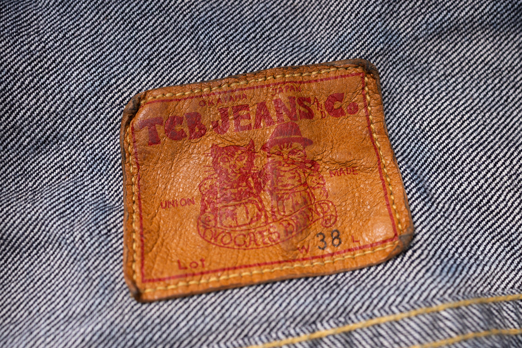 Levi's jeans label on a denim fabric background