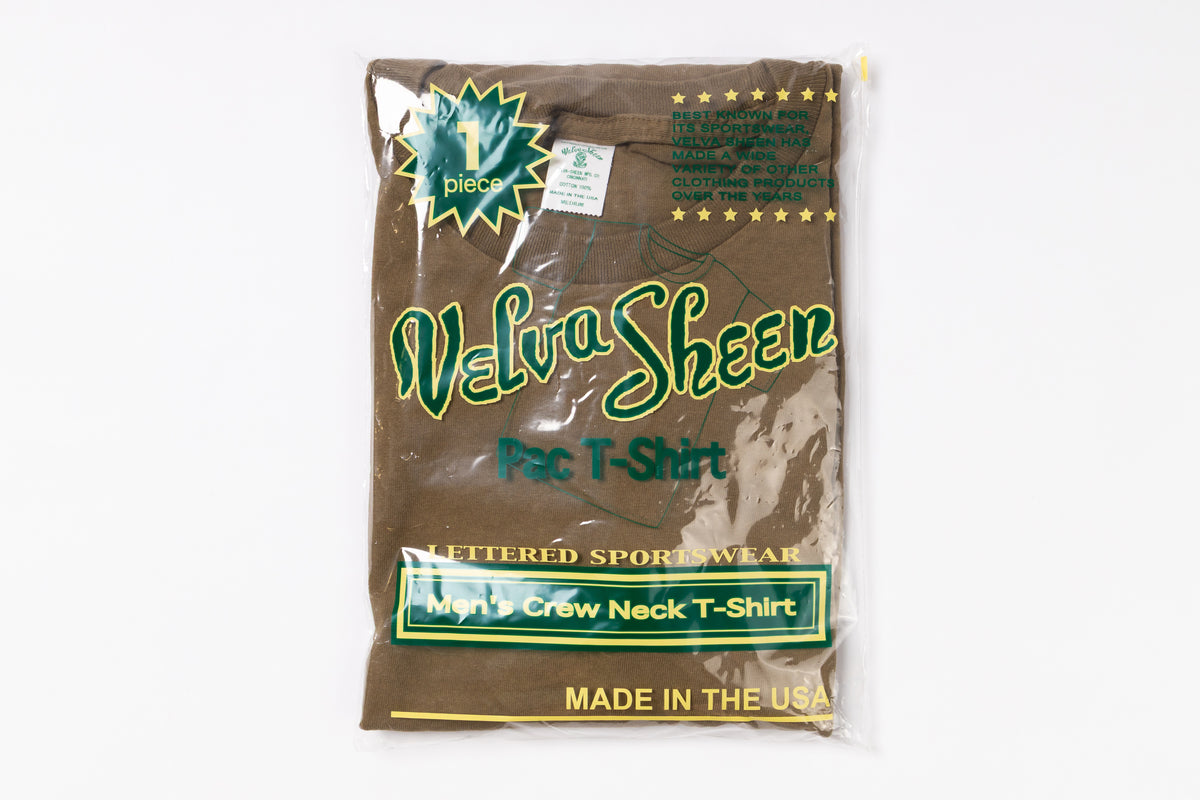 Package of Velva Sheen T-shirt with branding and text on a white background