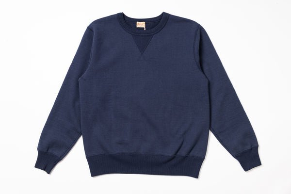 Navy blue sweater on a white background